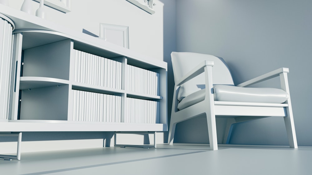 a white chair sitting next to a book shelf