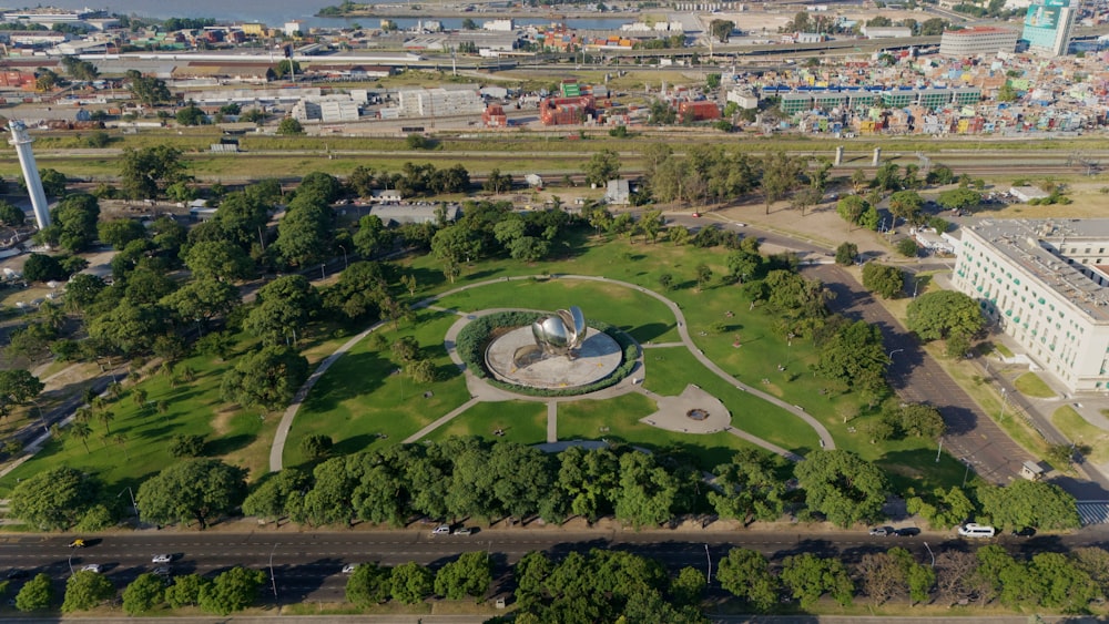 an aerial view of a park and a city
