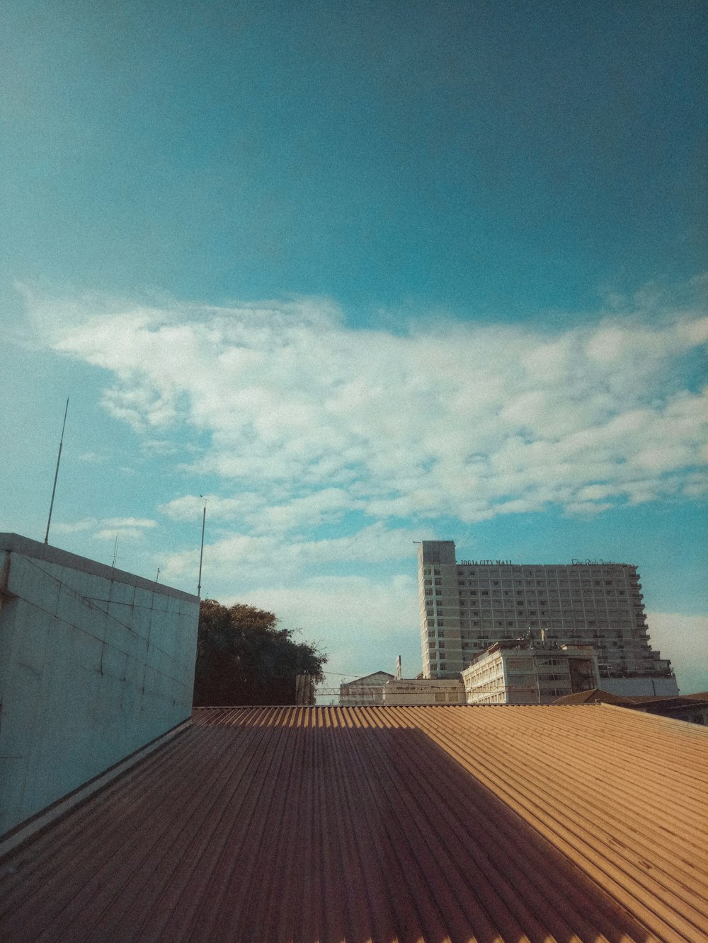 a view of a building from the roof of a building