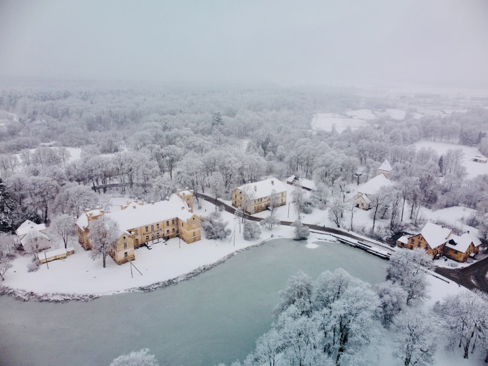 an aerial view of a snow covered town