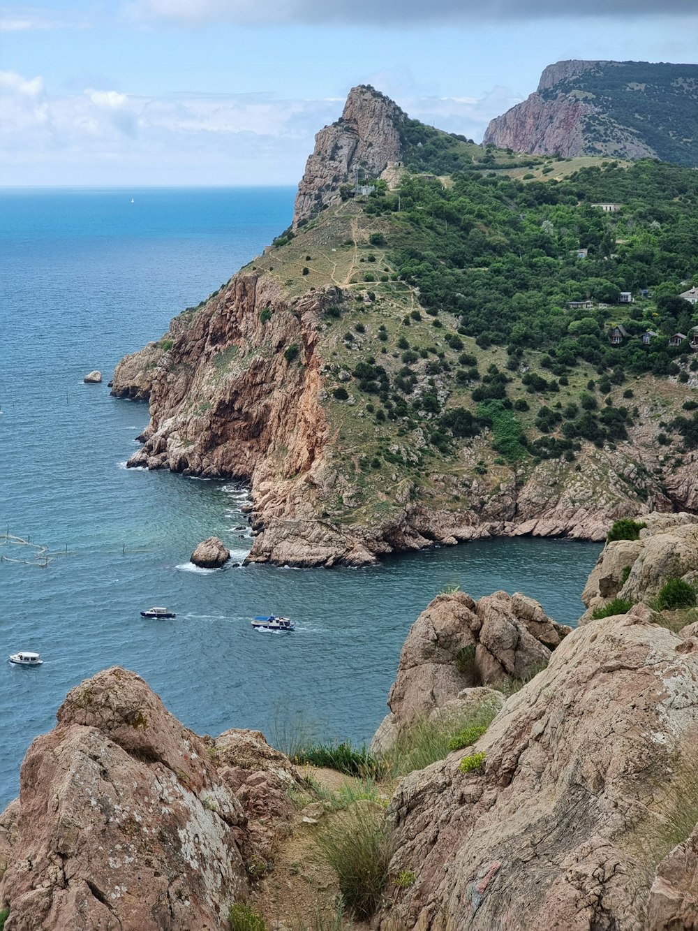 a view of a body of water from a hill