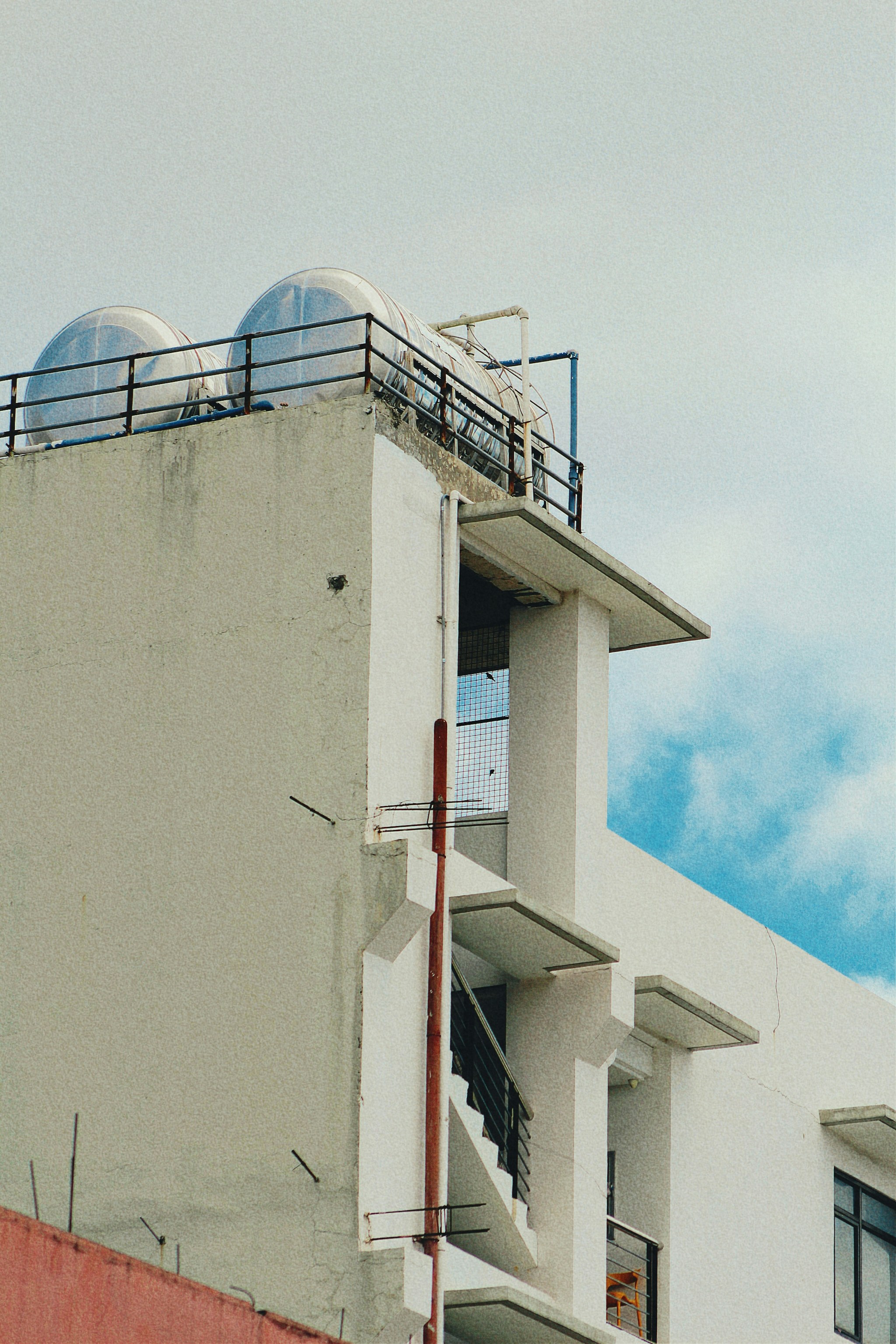 a tall building with a clock on the top of it
