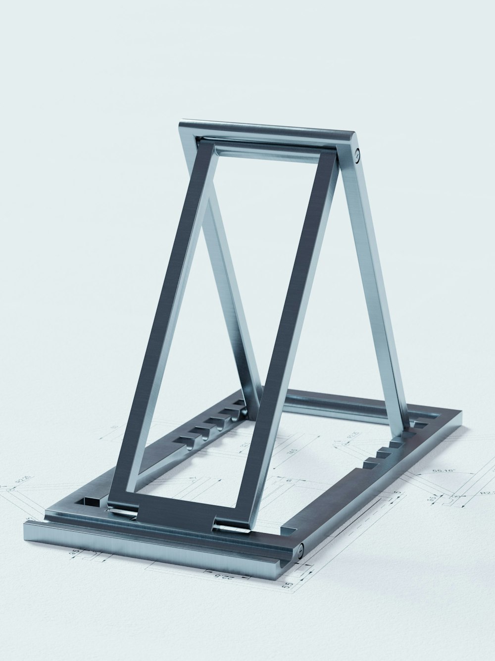 a metal frame sitting on top of a blueprint