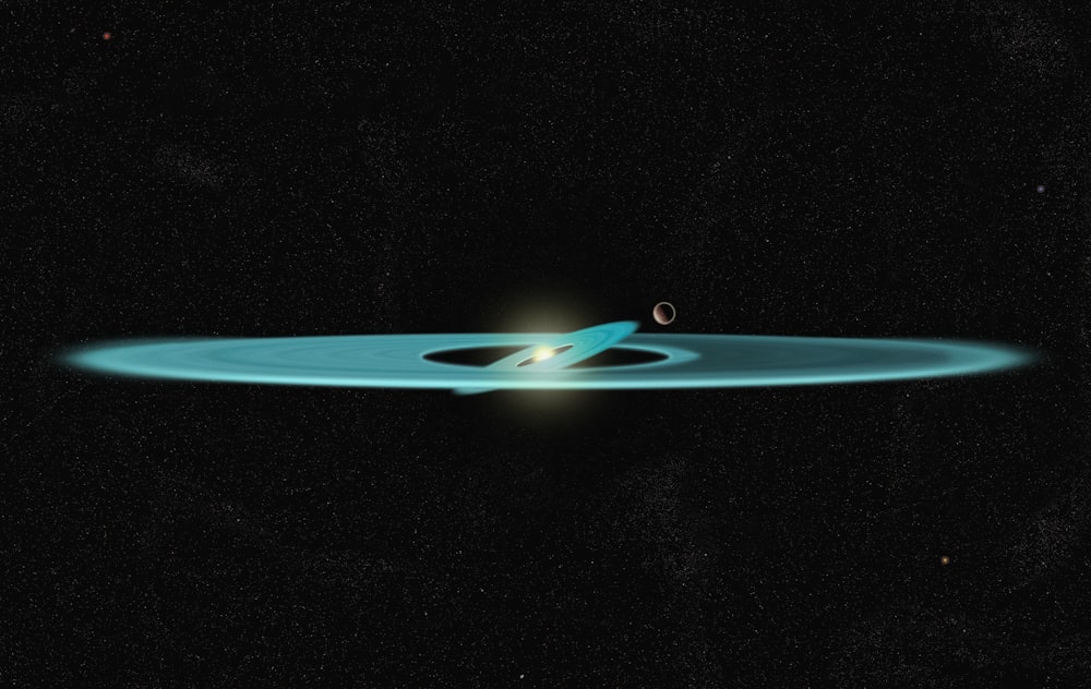 a black hole with a blue ring around it