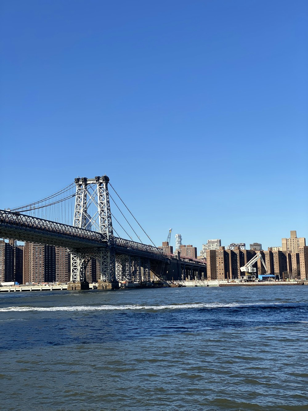 a large bridge spanning over a large body of water