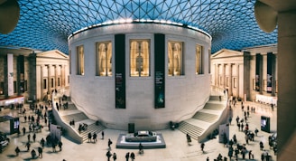 a group of people standing around a building