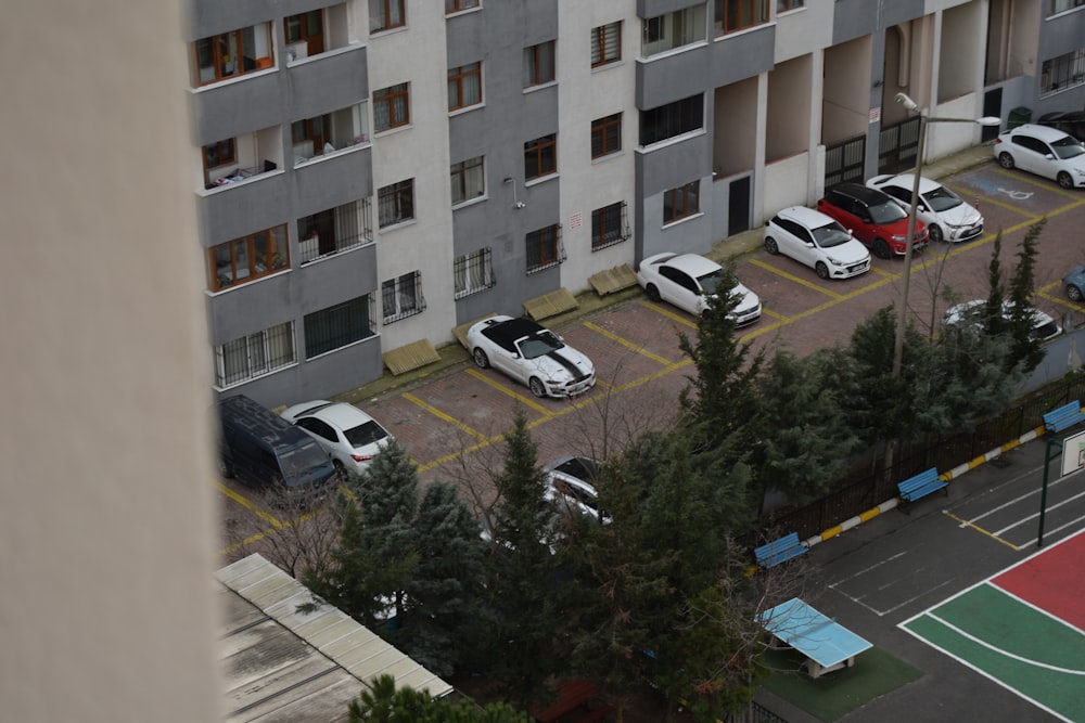 a parking lot filled with lots of parked cars