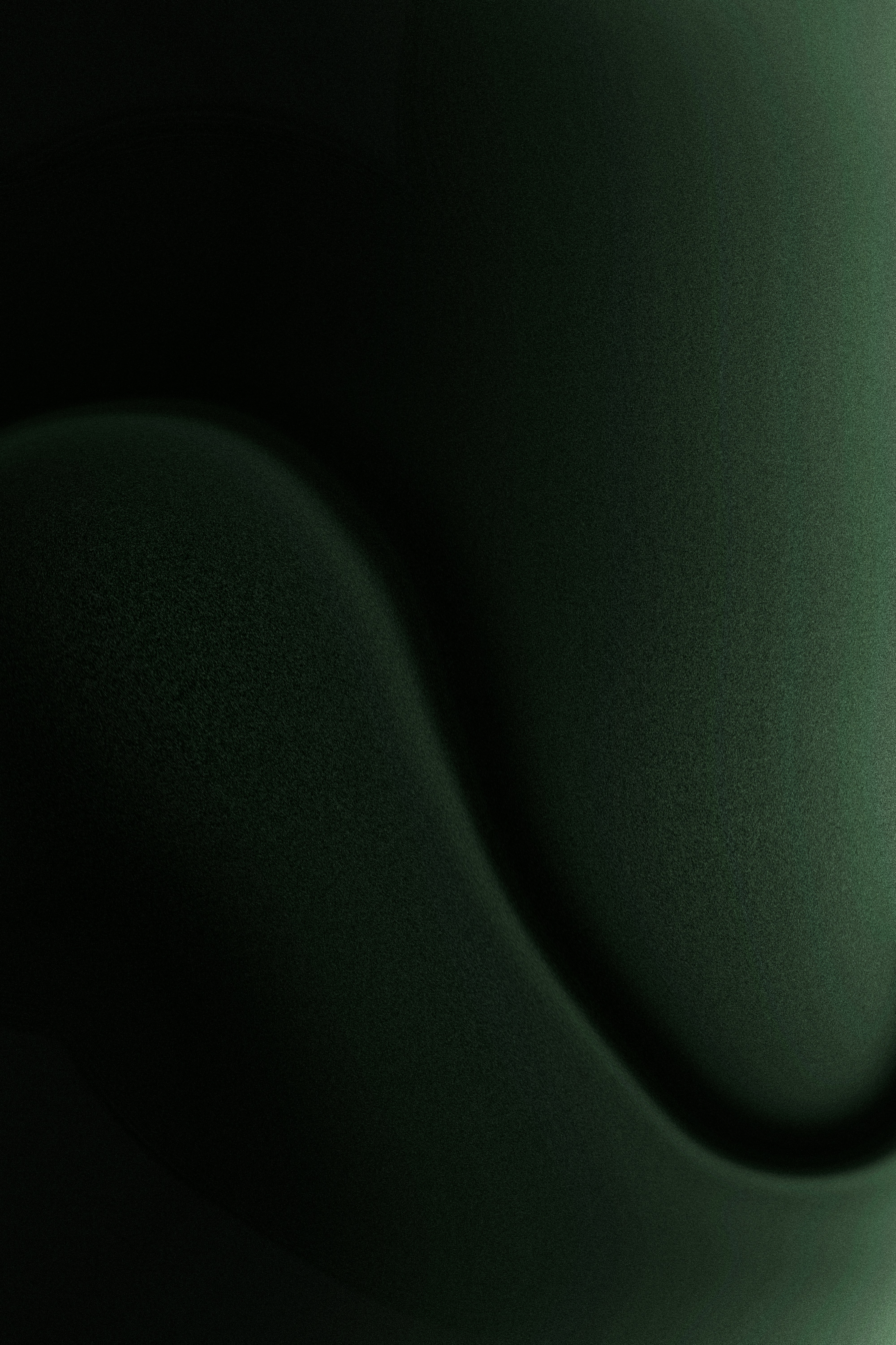 a black and white photo of a curved object