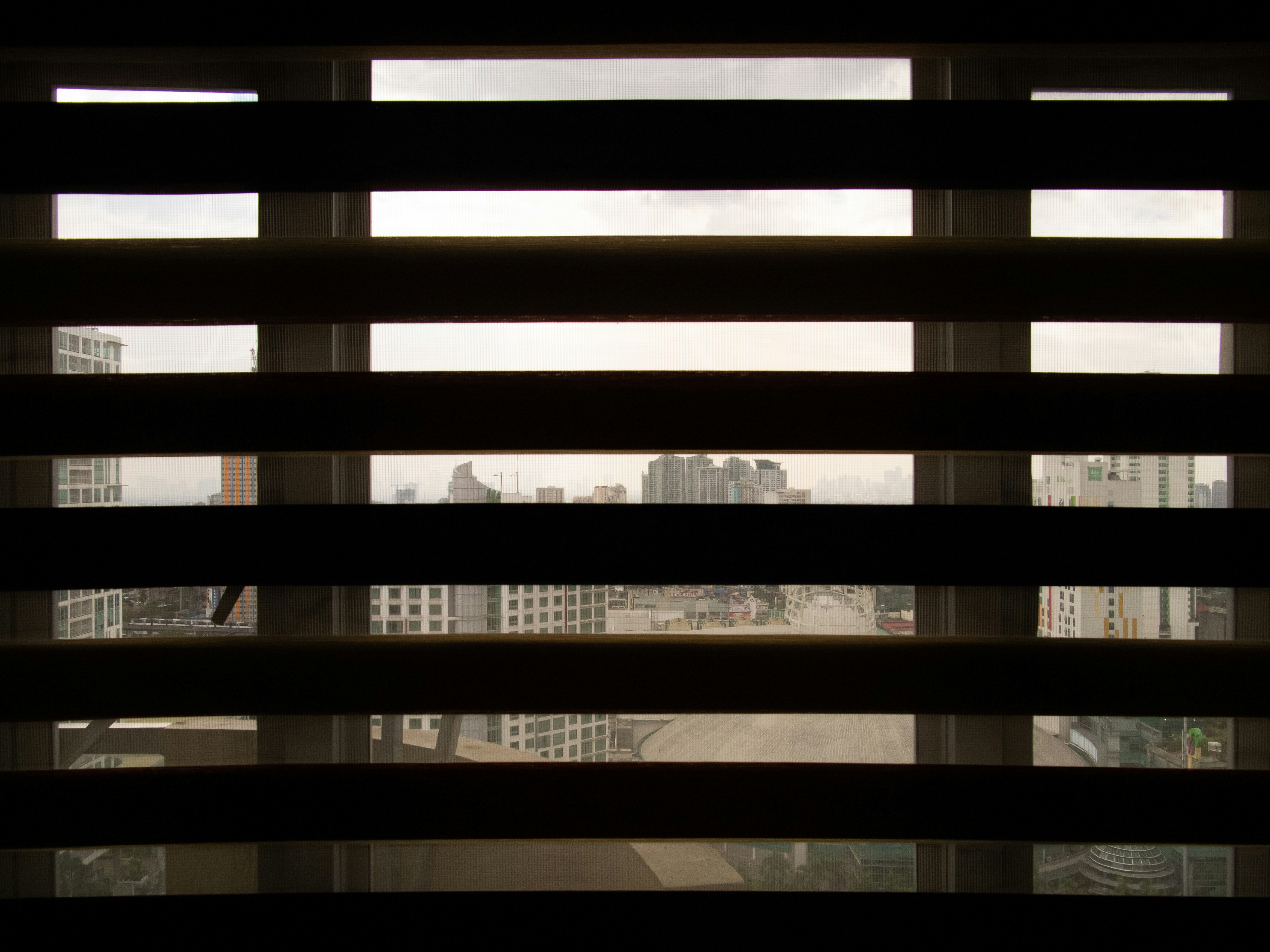 a window with a view of a city