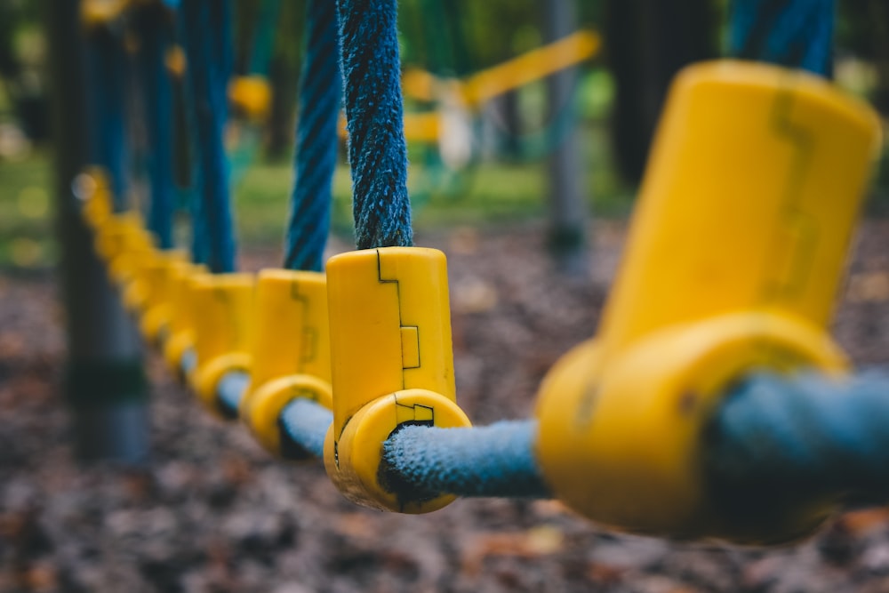 a close up of a yellow fire hydrant