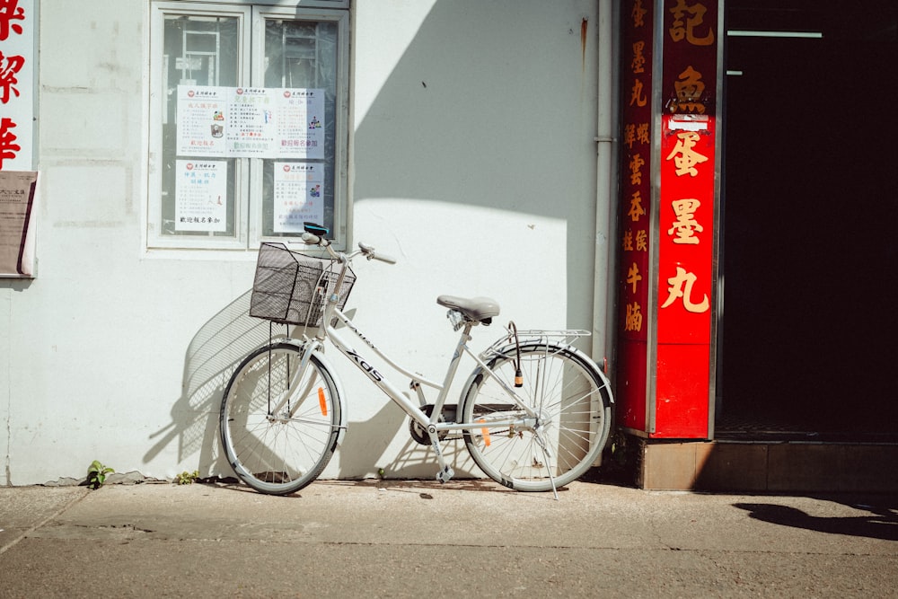 a bicycle parked in front of a building