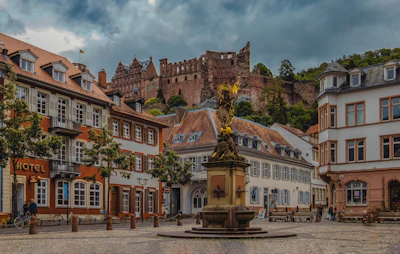 a fountain in the middle of a town square