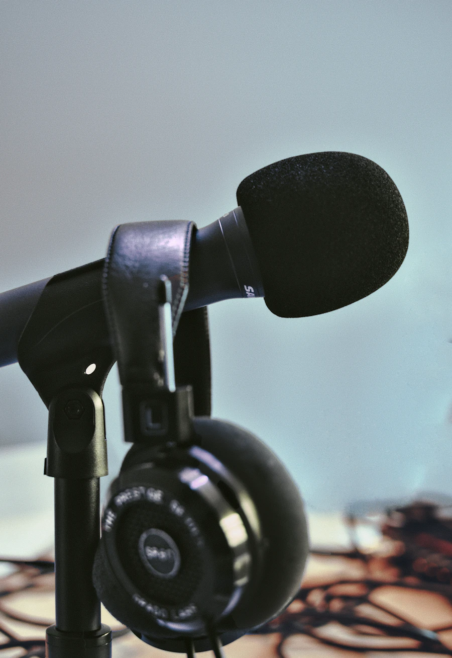 Professional microphone and headphones in a recording setup