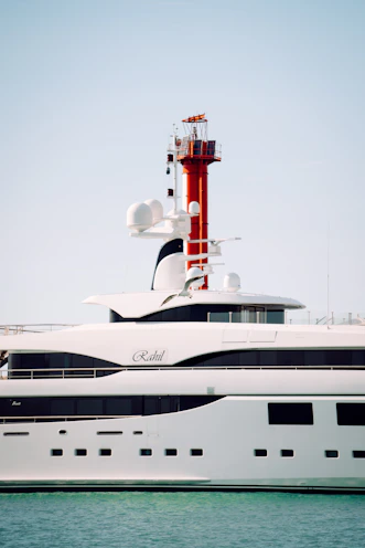 a large white boat floating on top of a body of water