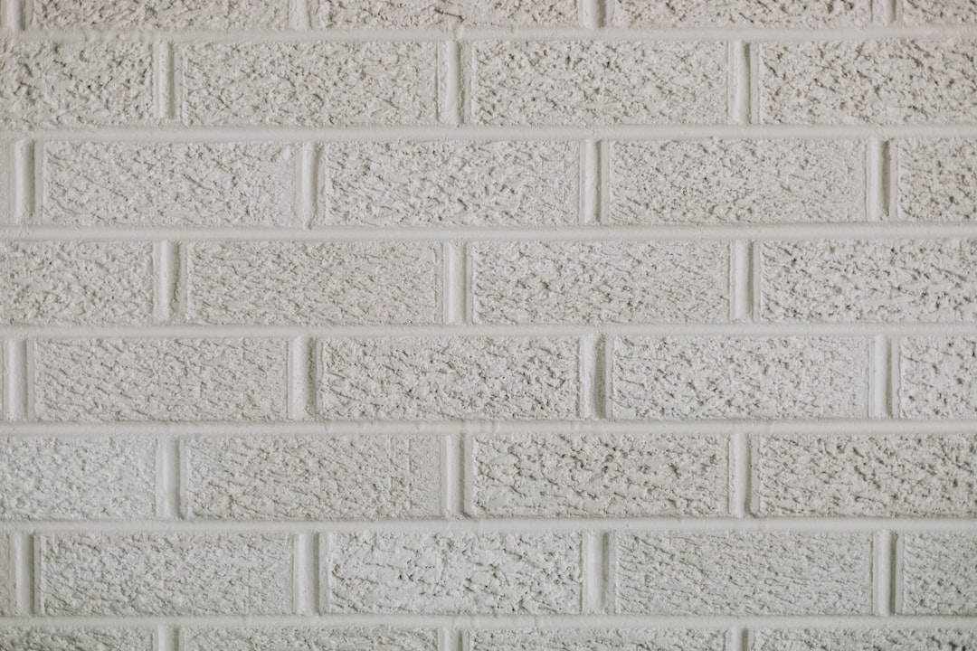 a close up of a white brick wall