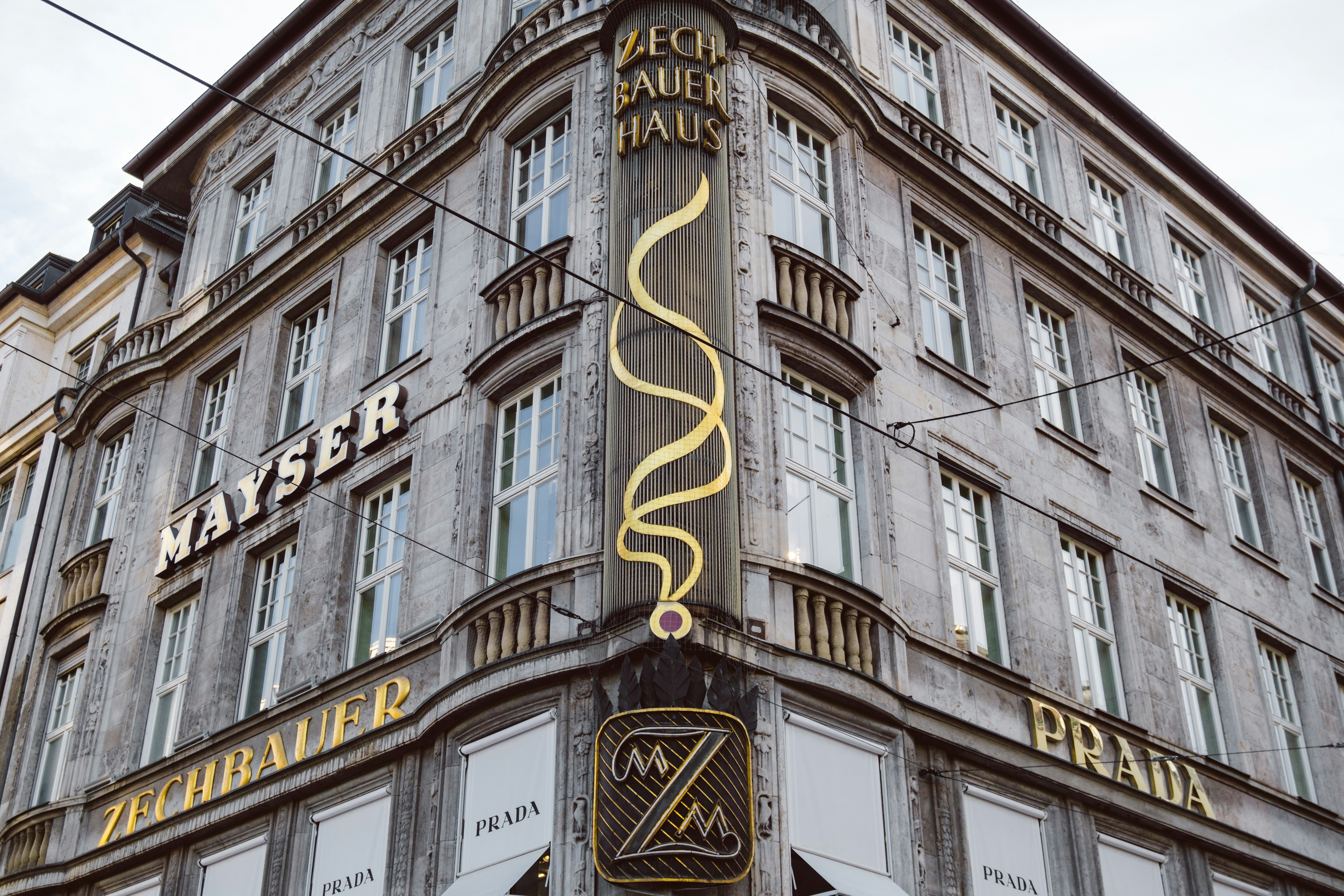 a tall building with a sign on the side of it