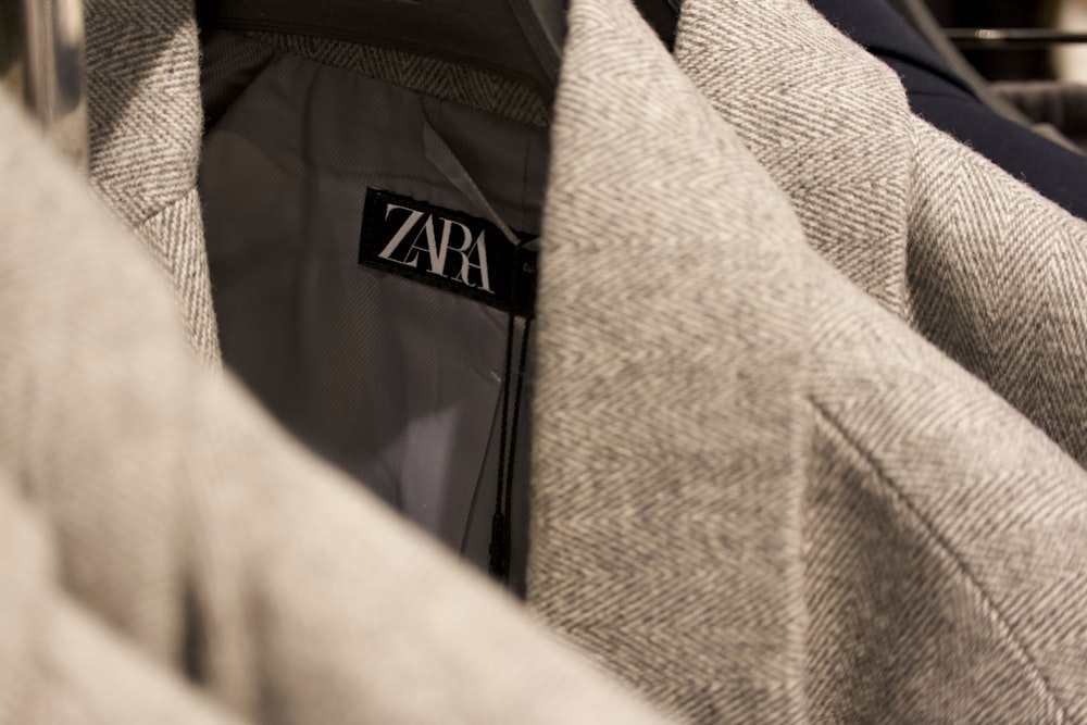 a close up of a jacket with a name tag on it