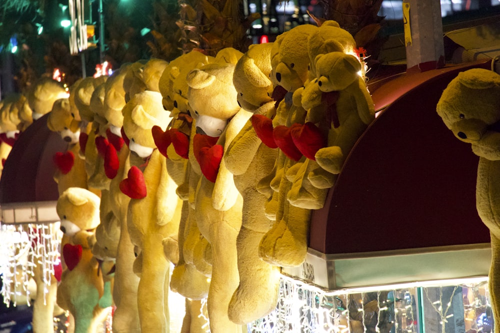 a row of teddy bears hanging from the ceiling