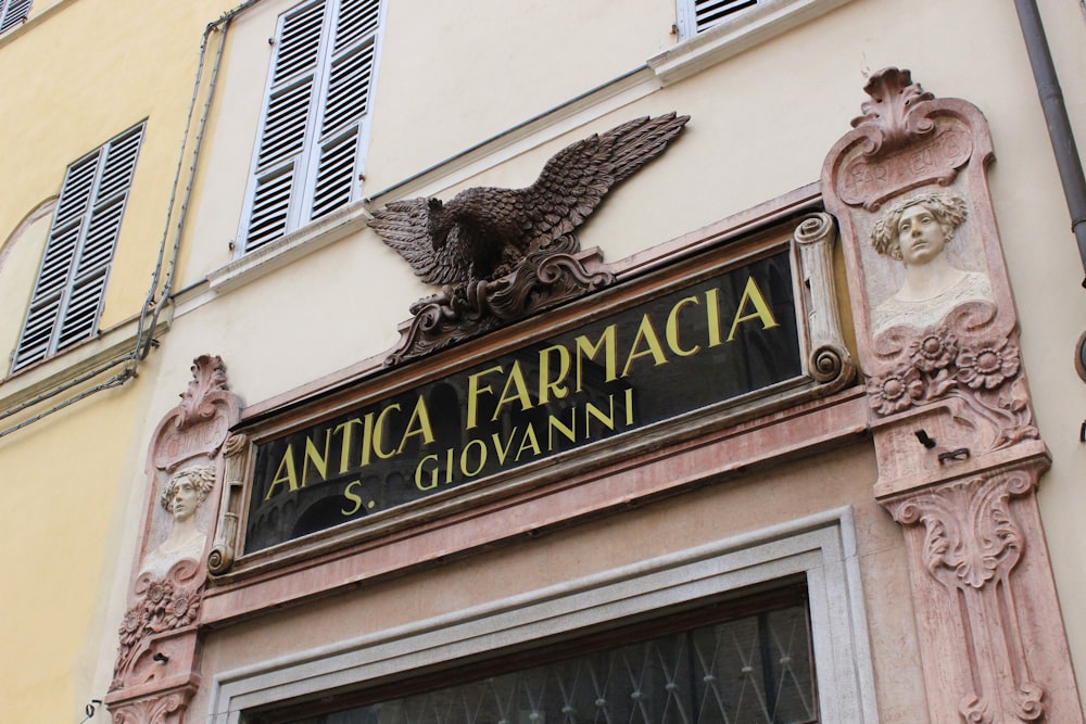 a close up of a sign on a building