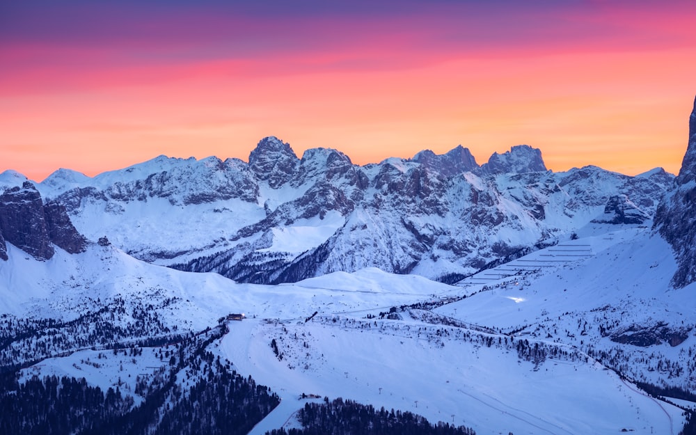 a view of a mountain range at sunset