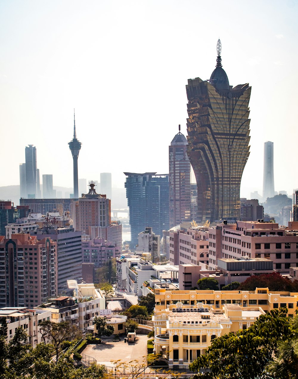 a view of a city with tall buildings