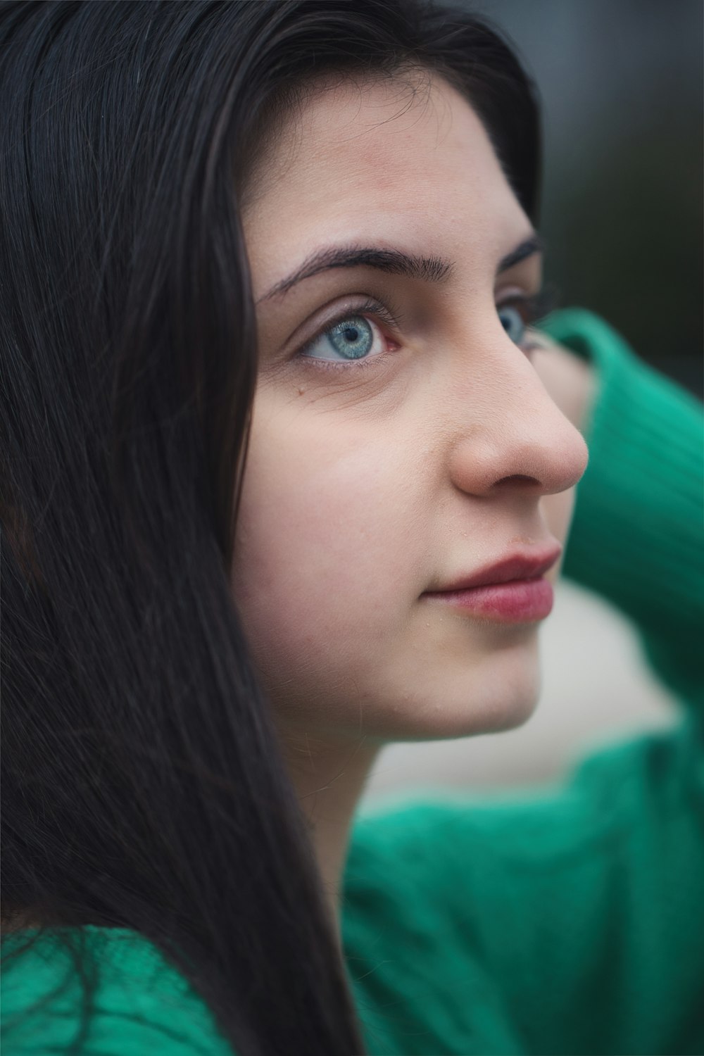 a close up of a person with long hair