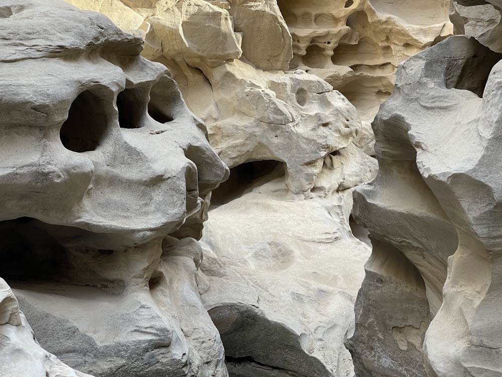 a group of rocks with holes in them