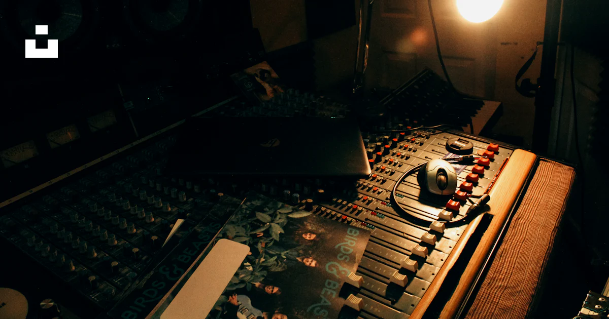 A recording studio with a laptop and sound equipment photo β Free Rock ...
