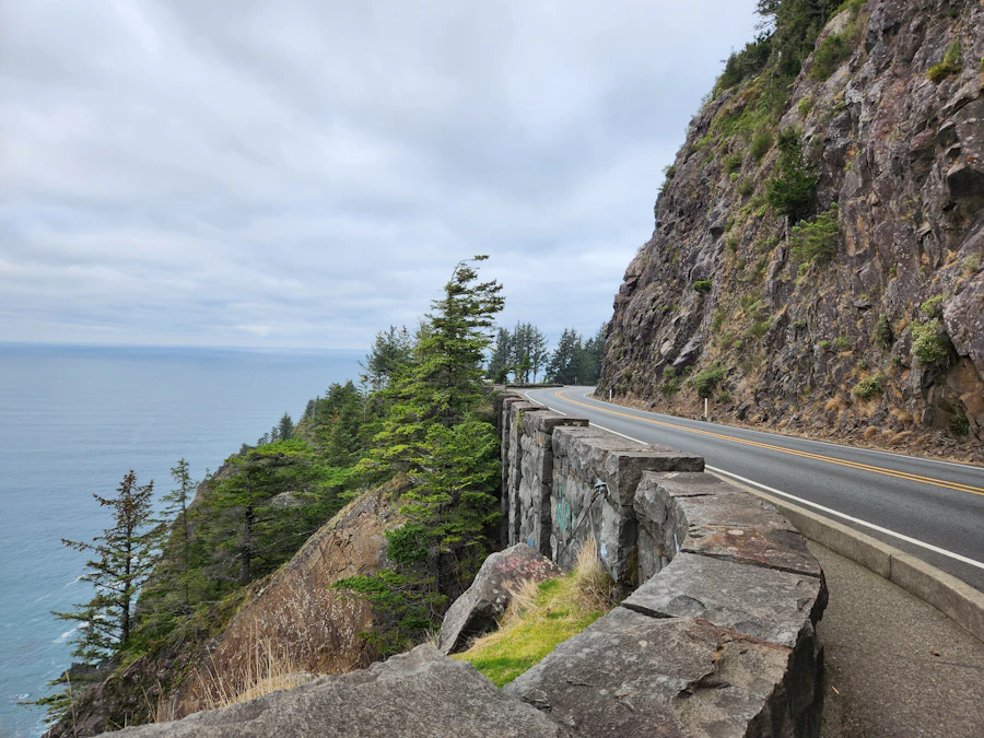 A cliffside road winding along the ocean