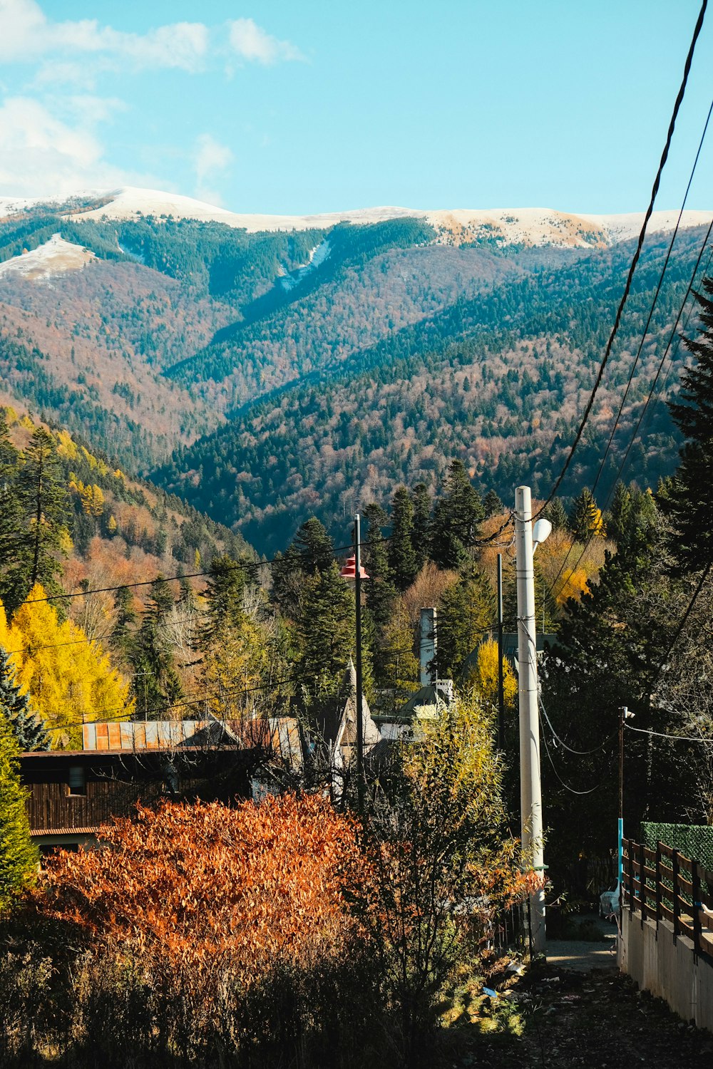 a view of a mountain range with a flag in the foreground