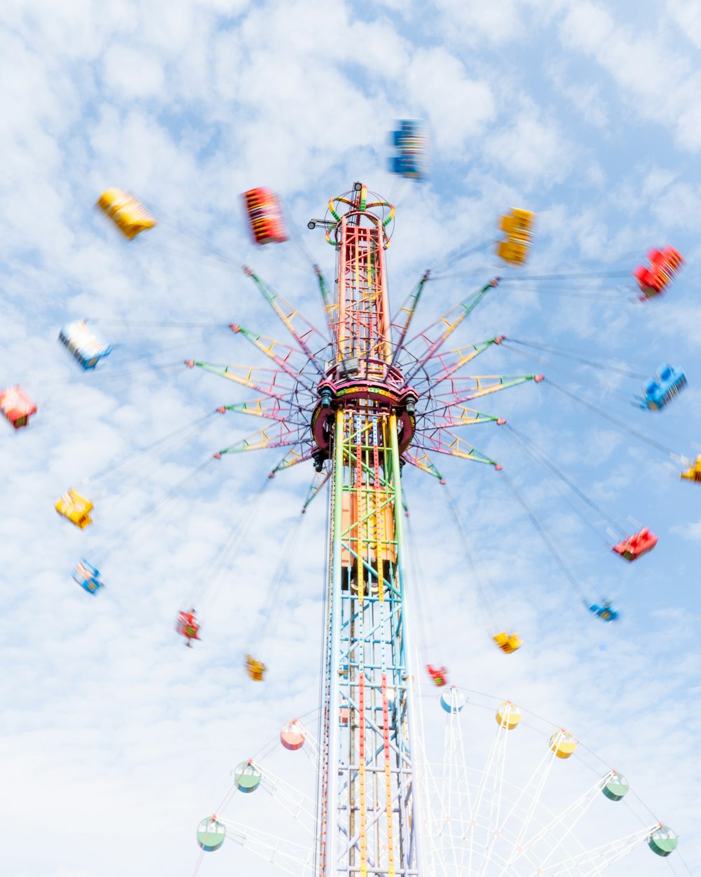 a ferris wheel with a sky background