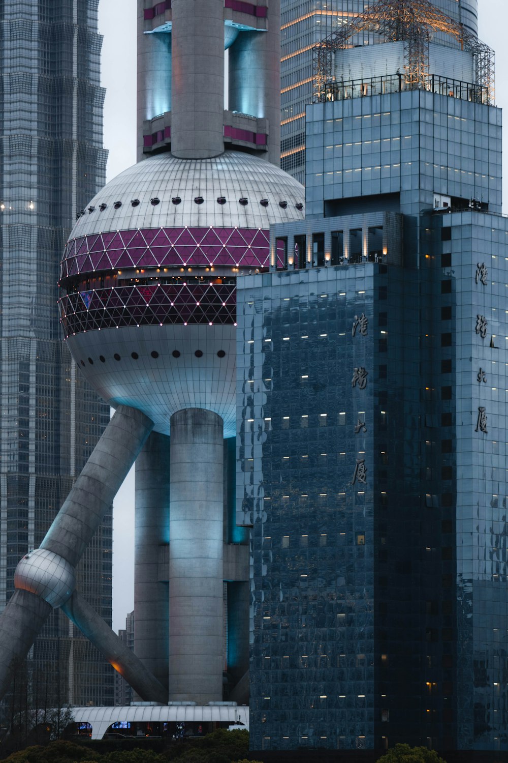 a very tall building with a very large clock on it's side