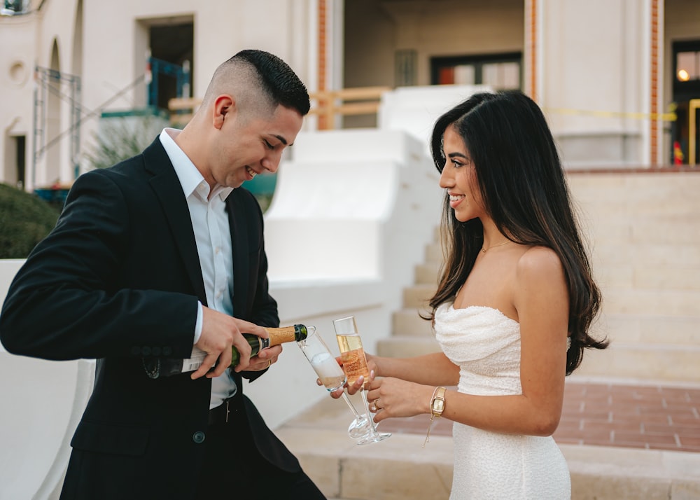 a man and a woman standing next to each other