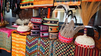 Colorful hats and woven items are on display.