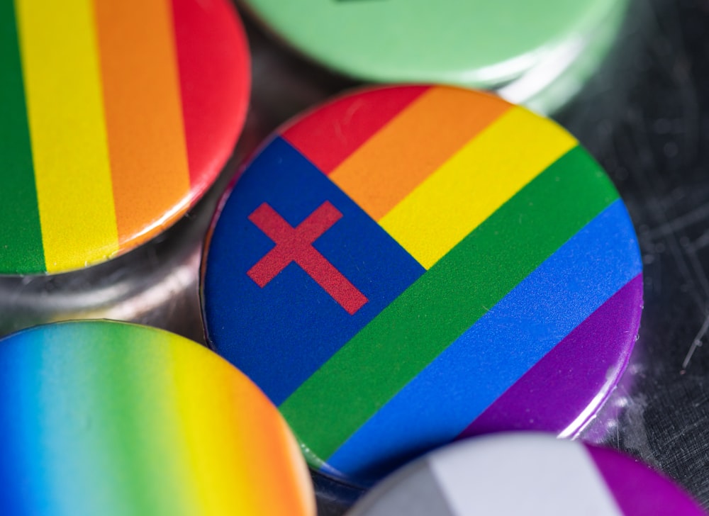 a group of buttons with a cross on them