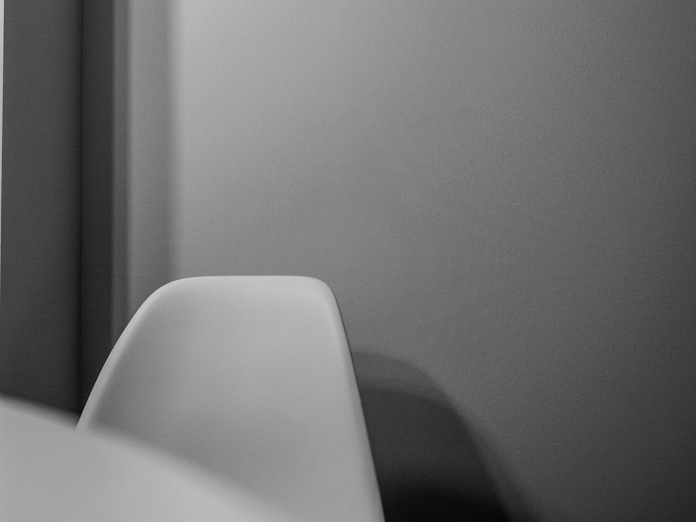 a black and white photo of a bathroom sink