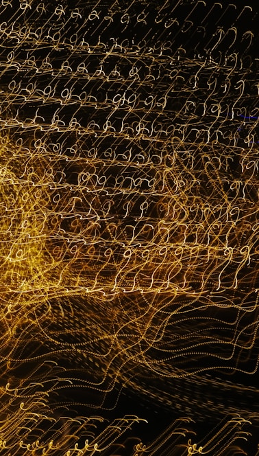 a blurry photo of a clock tower at night