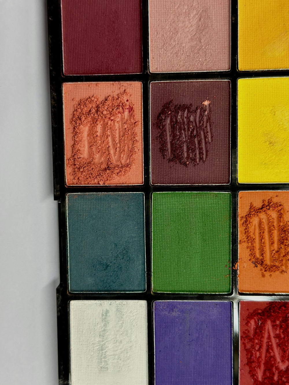 a close up of a multi colored palette