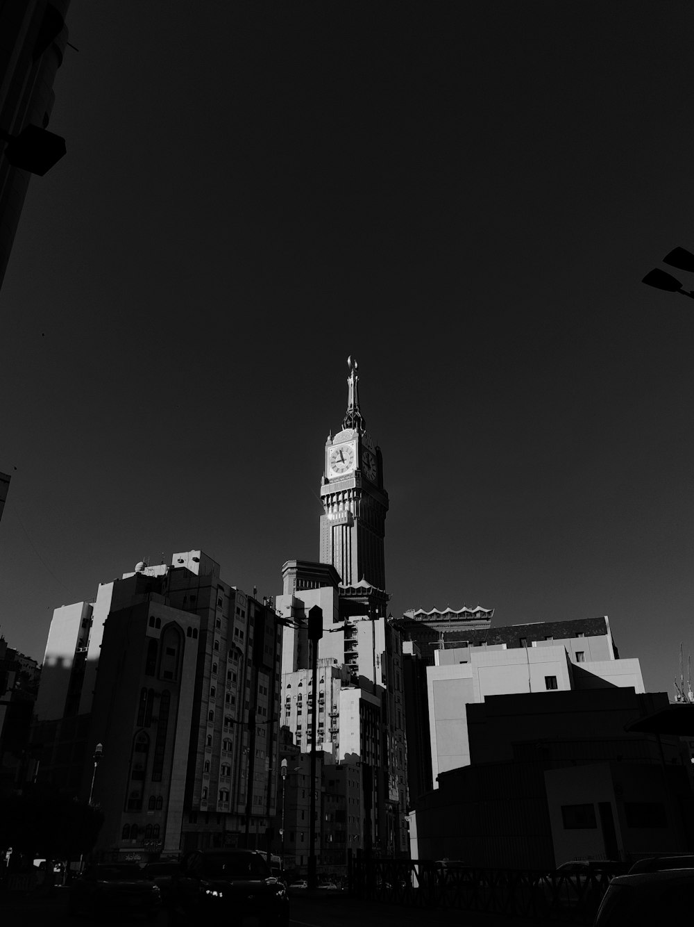 a black and white photo of a clock tower