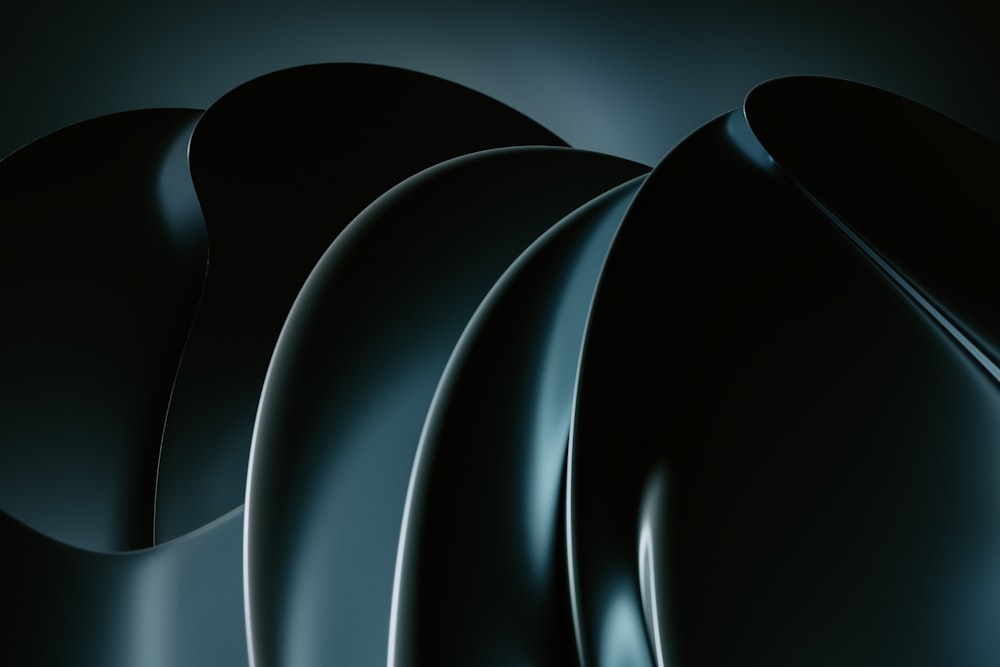 a black abstract background with curves and curves