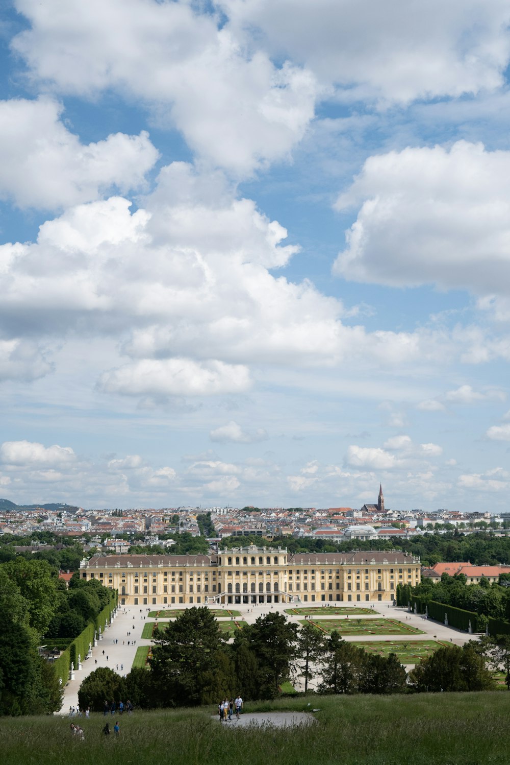 a view of a large building from a hill