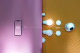 a cell phone is connected to a light switch