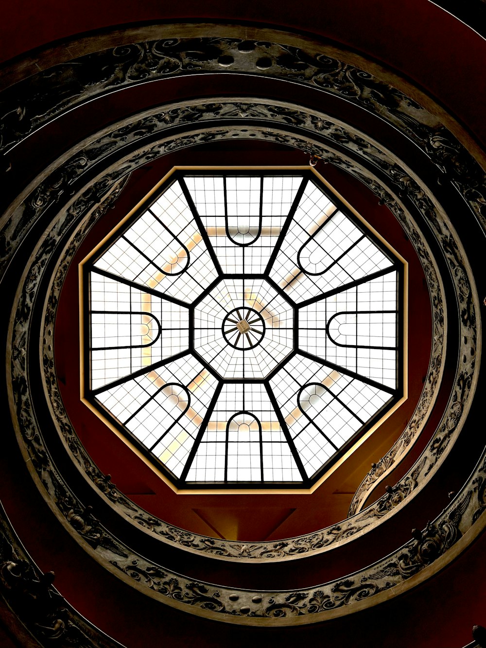 a round window with a skylight inside of it