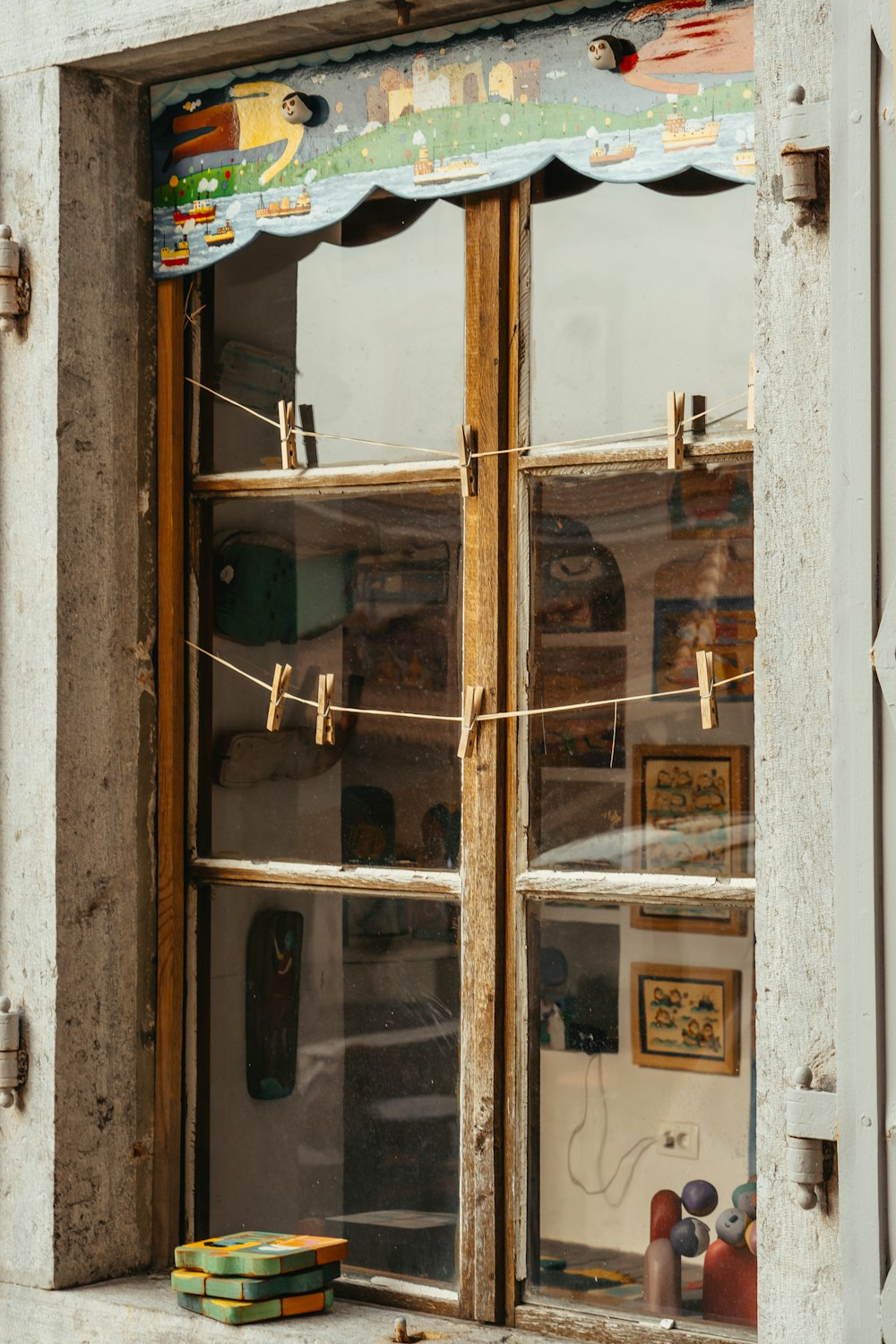 a window that has a bunch of pictures on it