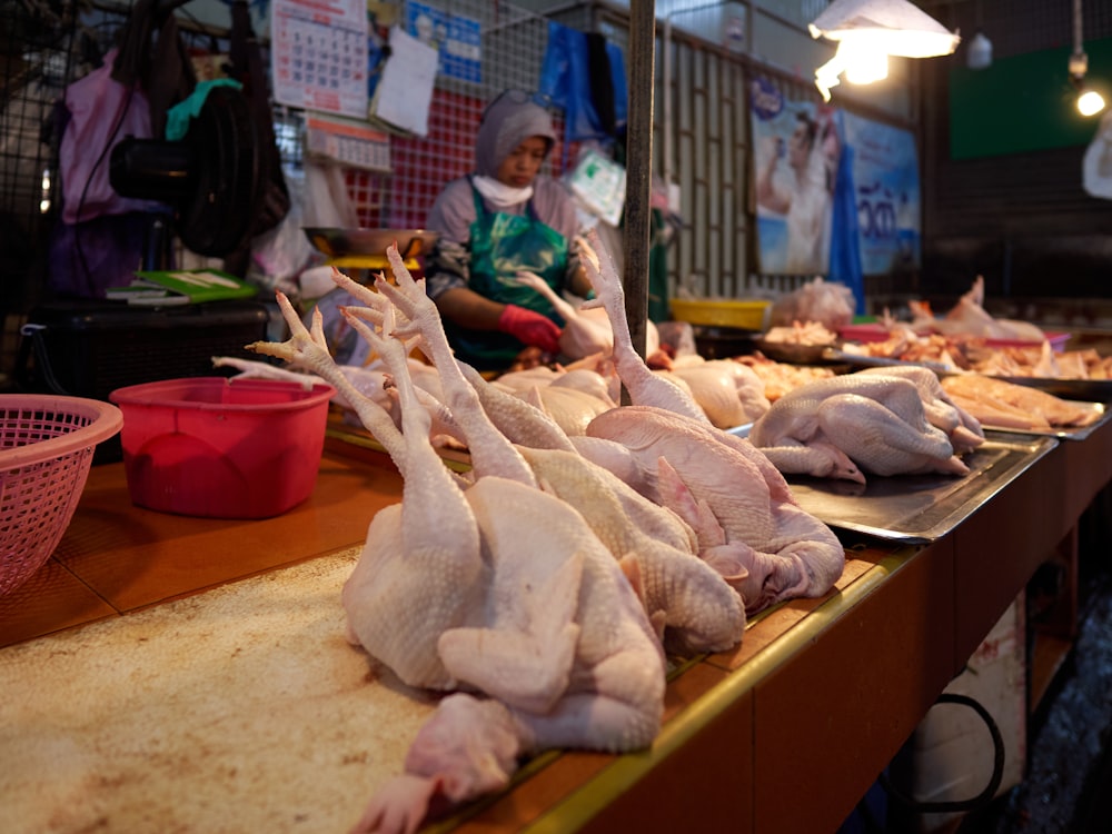 a bunch of chickens are on a table