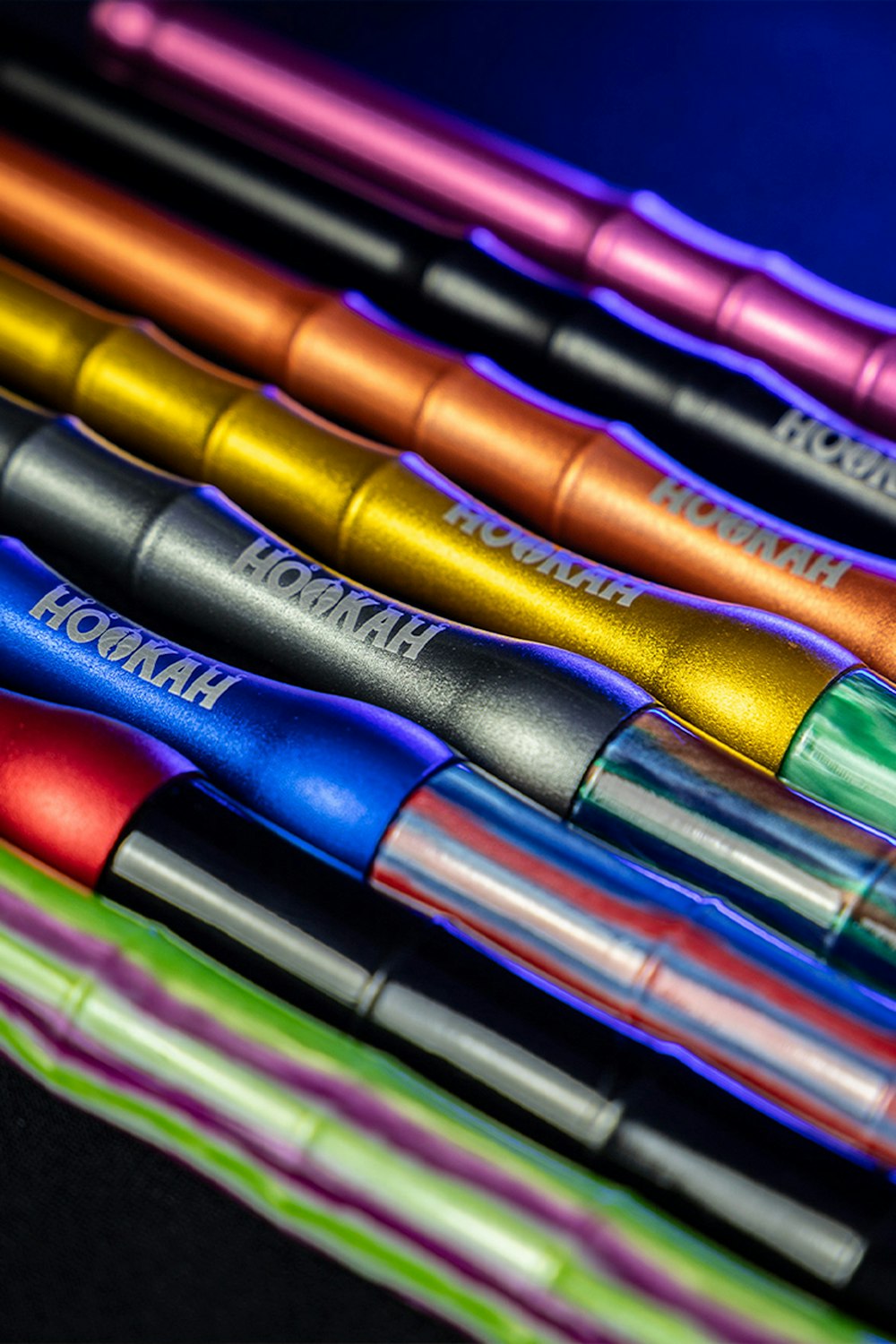 a group of pens sitting on top of each other