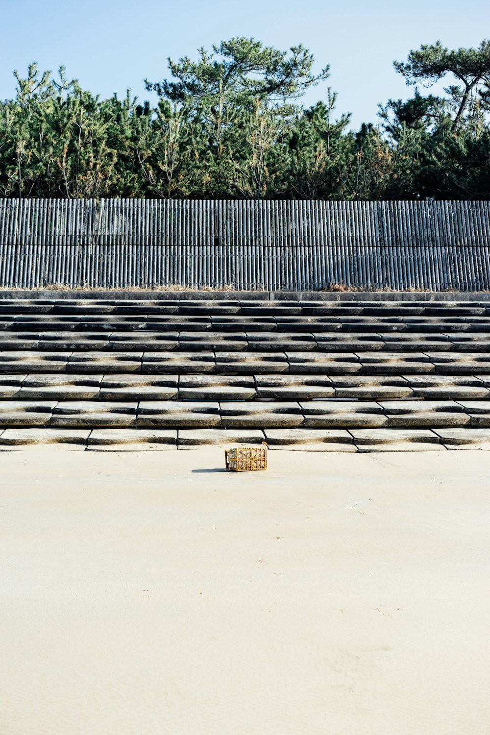 a cement floor with a metal grate on top of it