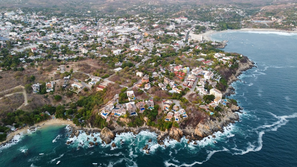 an aerial view of a small island in the middle of the ocean