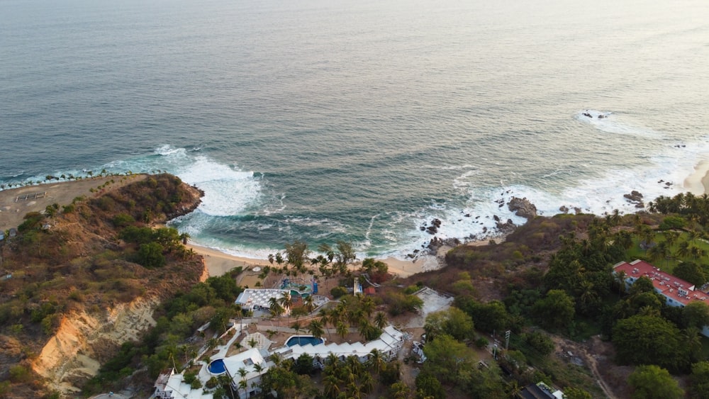 an aerial view of a beach and a body of water