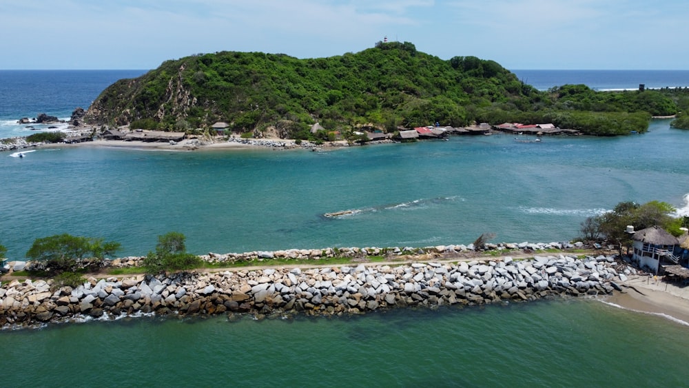 an aerial view of a small island in the middle of the ocean